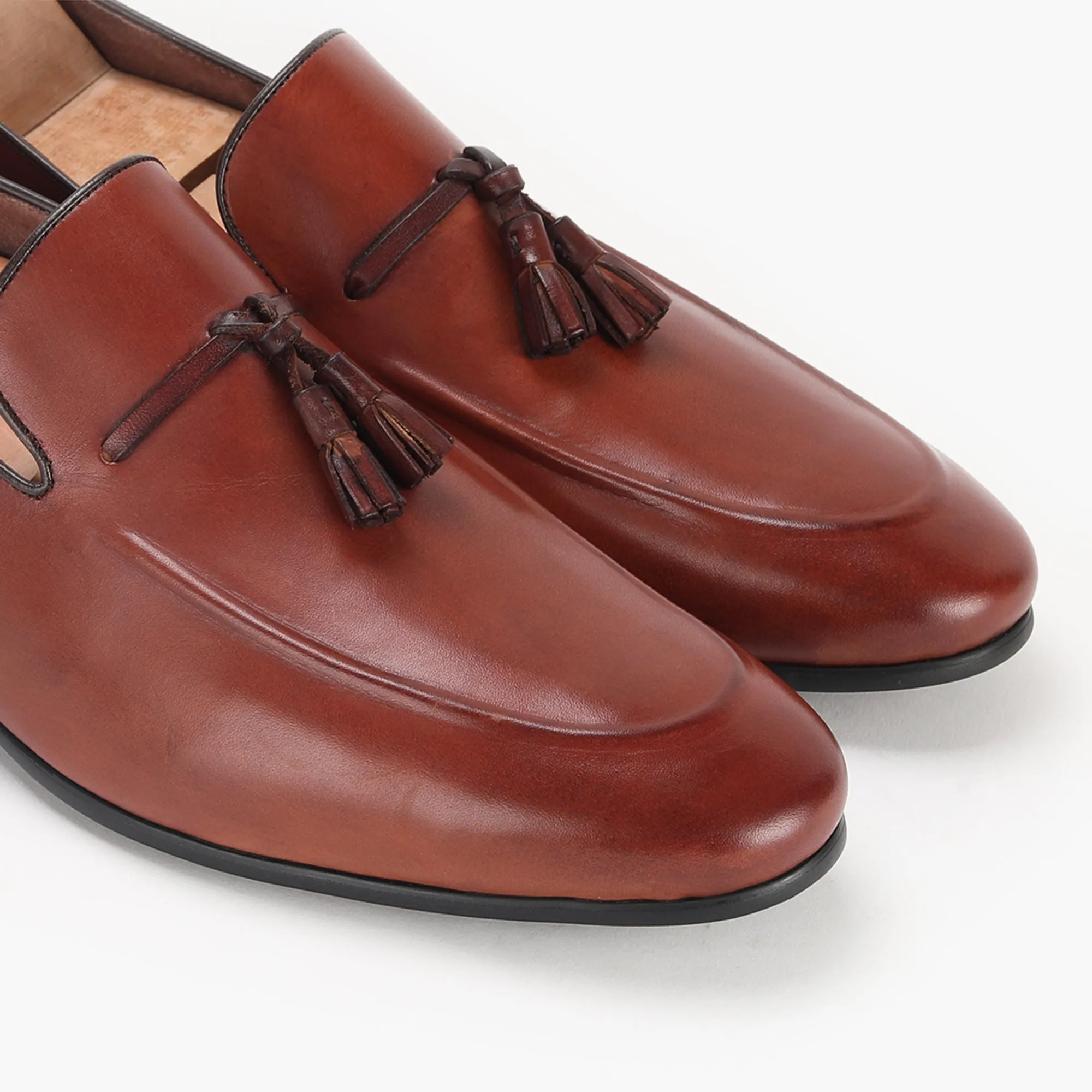 Burnished Leather Tassled Slip Ons